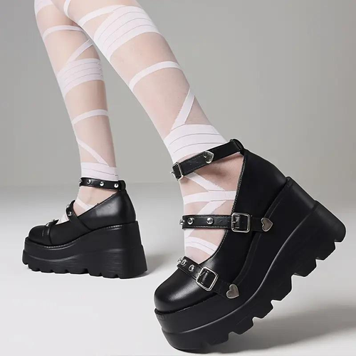 Black platform Mary Jane Lolita shoes styled with ribbon socks